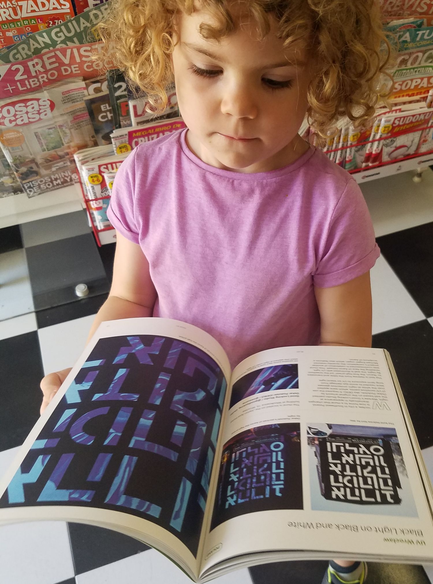 Girl reading a magazine.