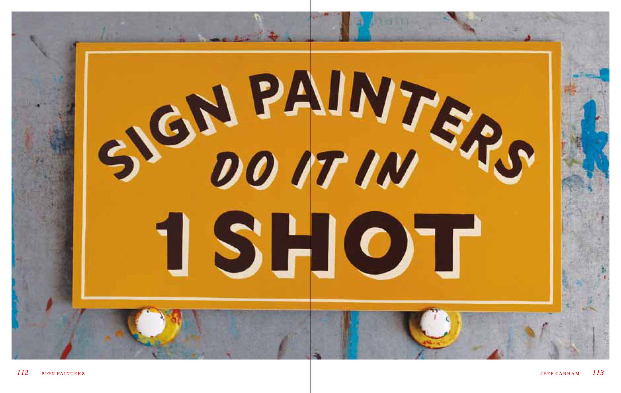 Painted sign reading "Sign Painters do it in 1 Shot"
