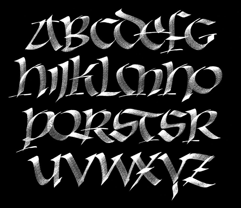 Uncial alphabet in white on black.