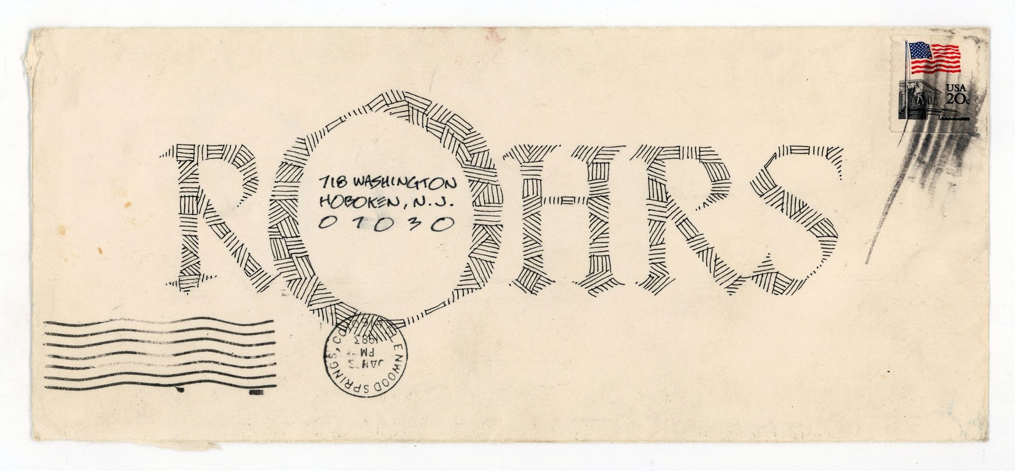 Envelope with decorative name and letter encircling the address.