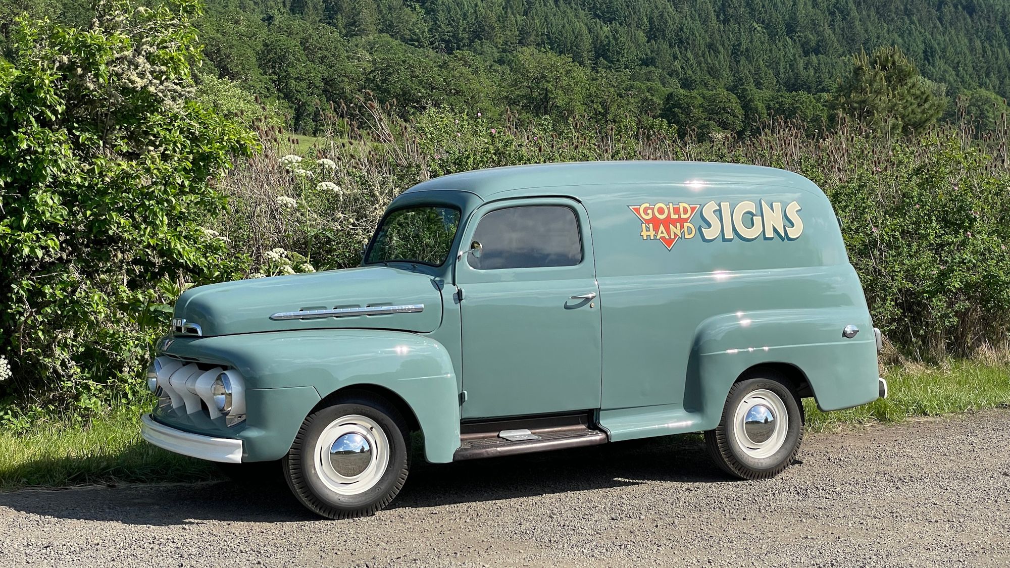 1951 Ford Panel Truck with 'Gold Hand Signs' painted and gilded on the side.