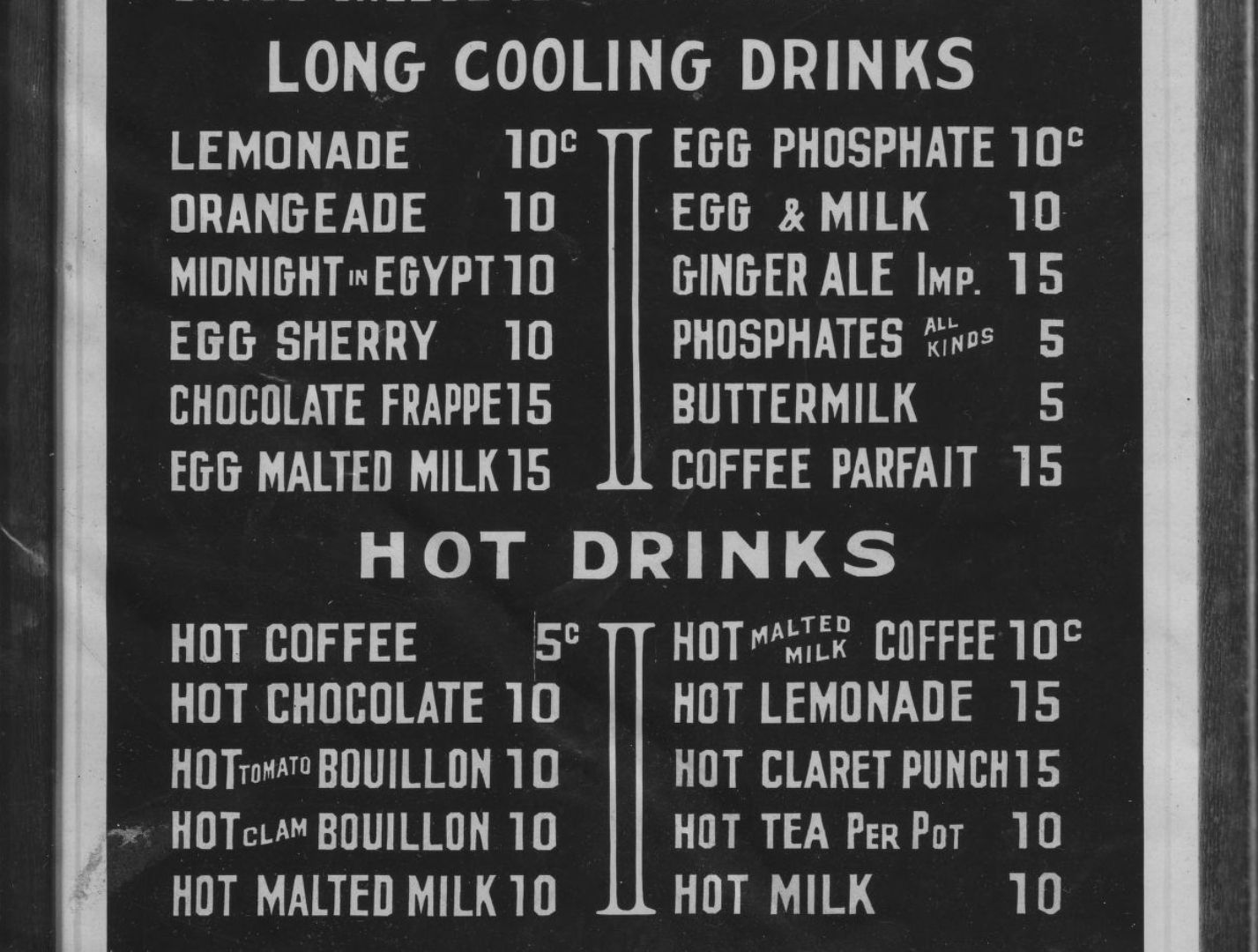 Portion of a menu set in white block lettering on a black background and showing "long cooling drinks" and "hot drinks".