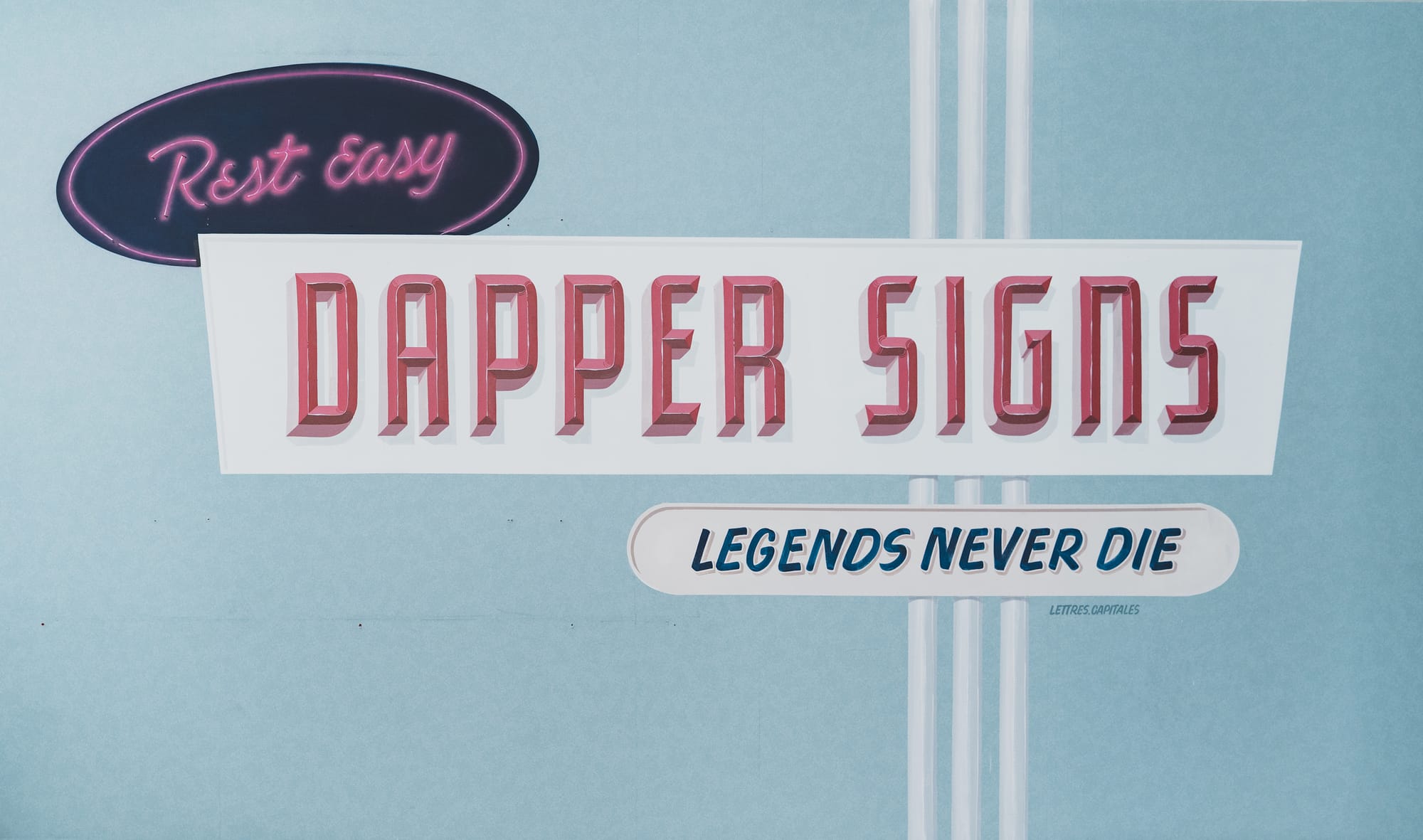 Hand-painted mural that reads "Rest Easy. Dapper Signs. Legends Never Die".