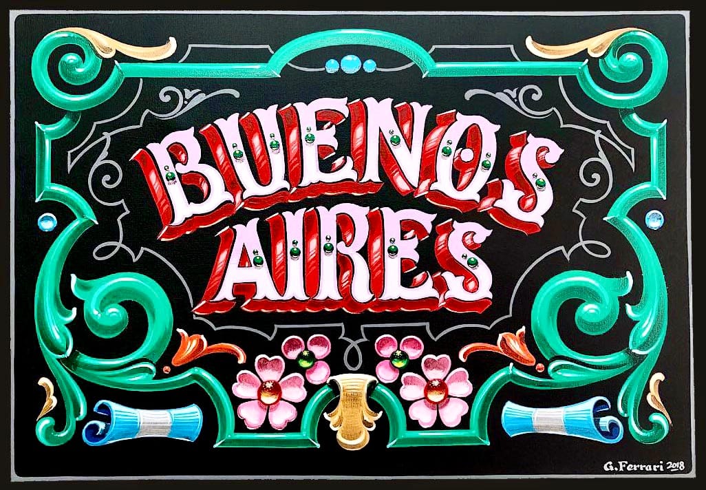 Colourful decorated panel in the Fileteado Porteño style, with a green frame, pink flowers, and central lettering that reads "Buenos Aires".