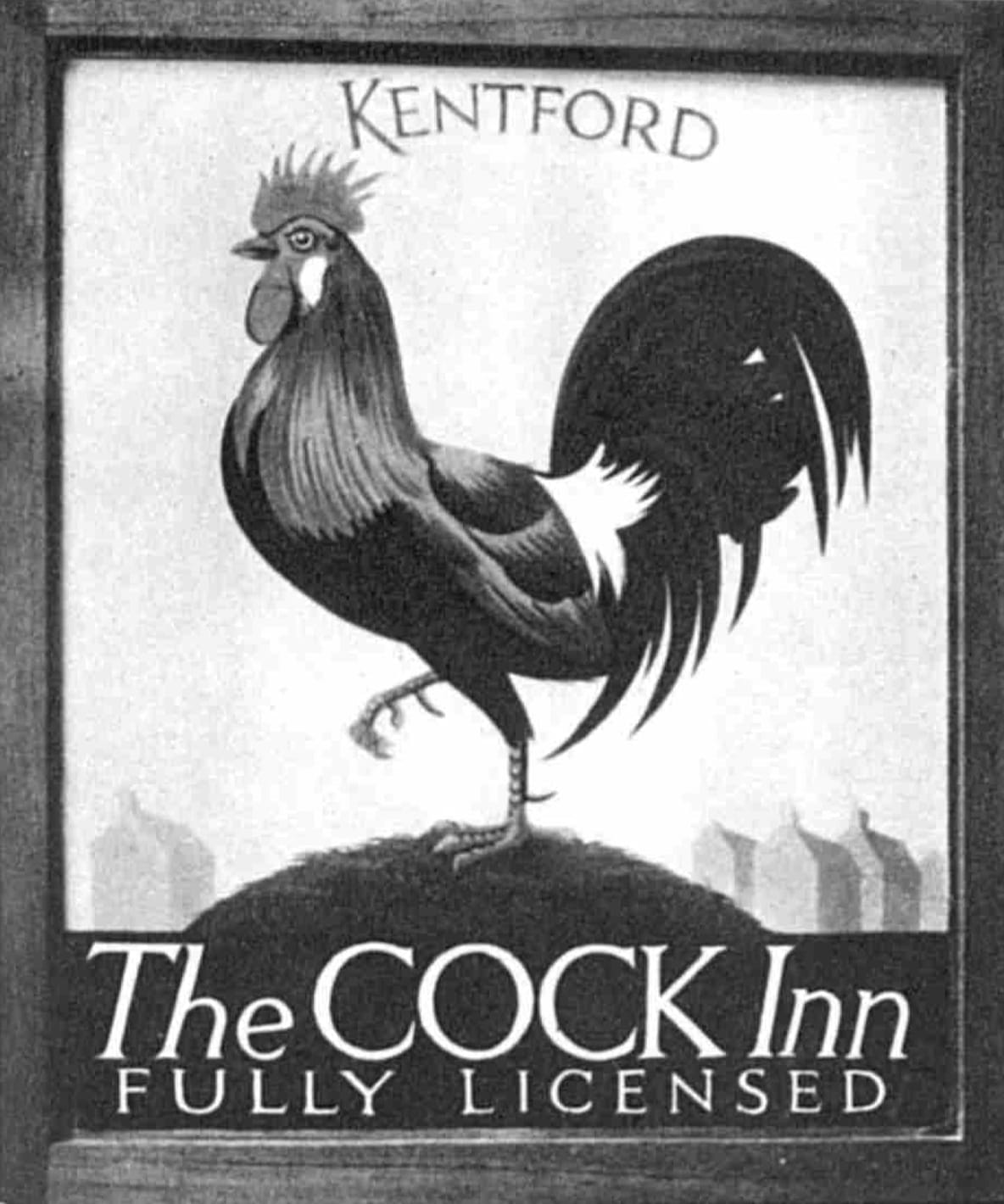 Painted inn sign in a frame. The main central section is an illustration of a cockerell, with "Kentford" lettered above this, and "The Cock Inn, Fully Licensed" below.