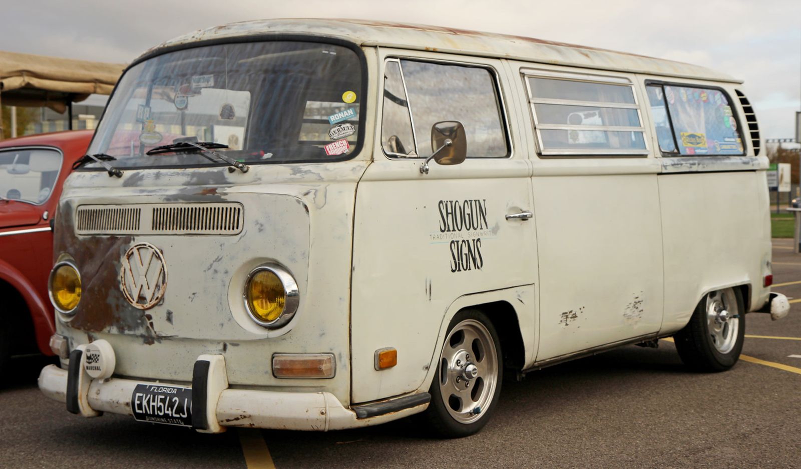 Old Volkswagen van with 'Shogun Signs' painted on the door.