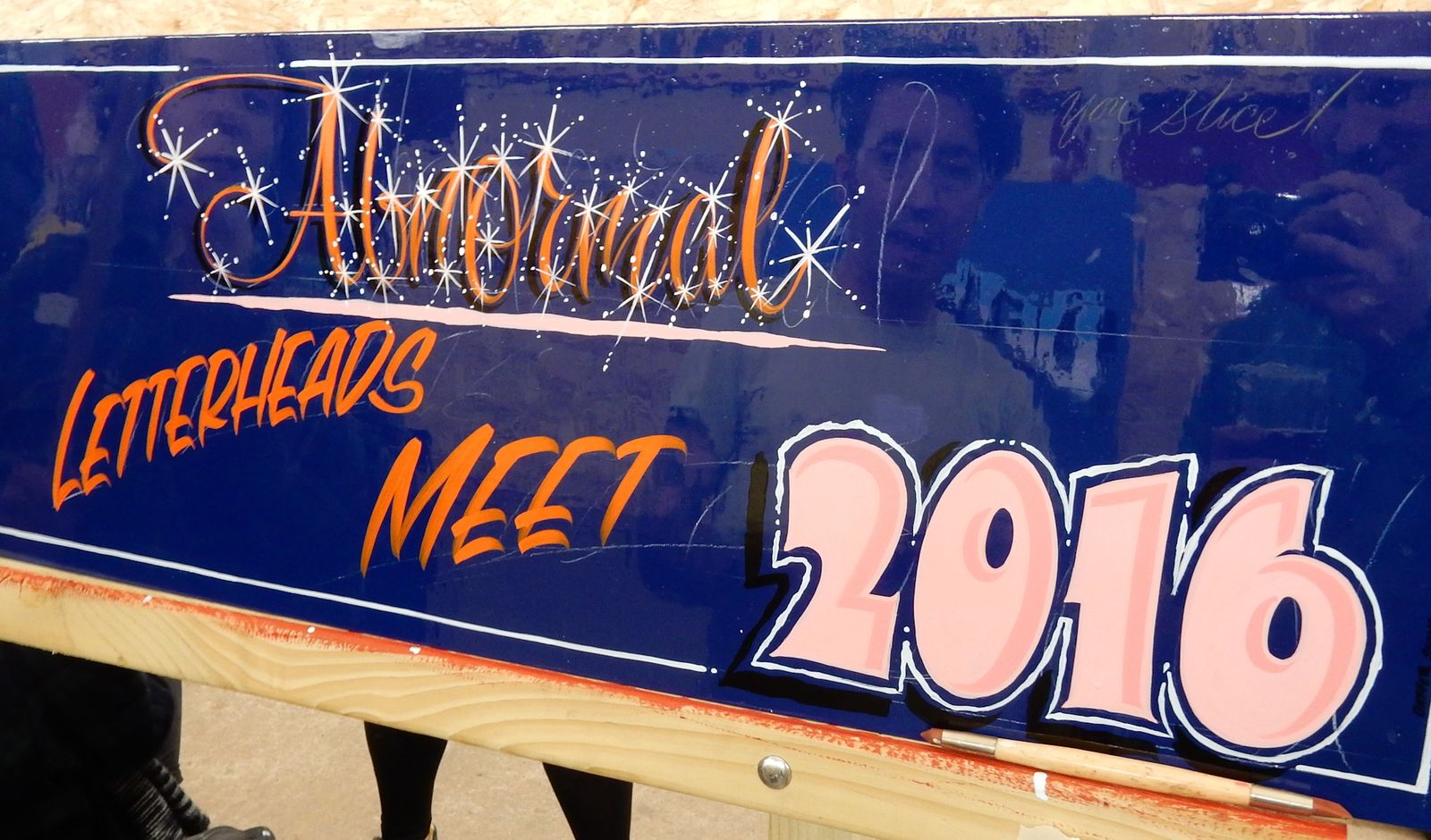 Hand-painted panel with lettering that reads "Abnormal Letterheads Meet, 2016".