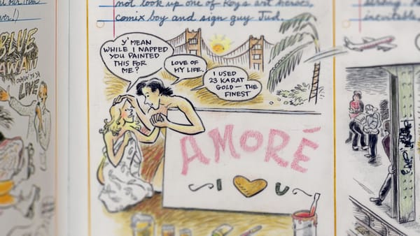 Panel from a comic showing two lovers discussing a sign ('Amore, I ❤️ U') that the man has painted for the woman.