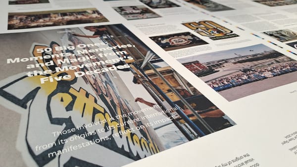 Close-up shot across a printed sheet from the production of a magazine with visible headline of "50 Big Ones: Moments, Memories, and Magic from the Movement's Five Decades".