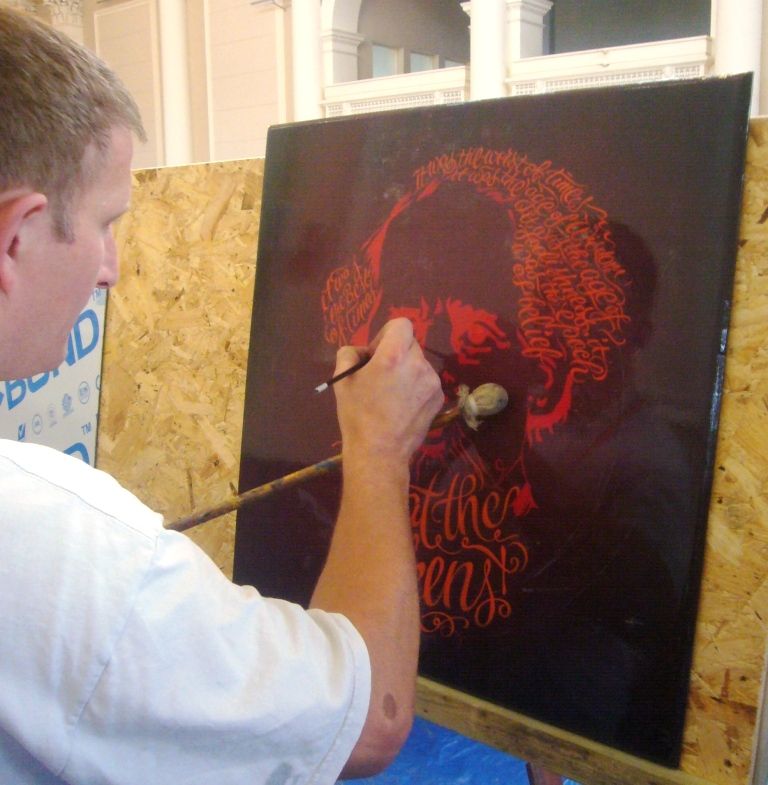 Wayne Osborne at work on his Dickens portrait.