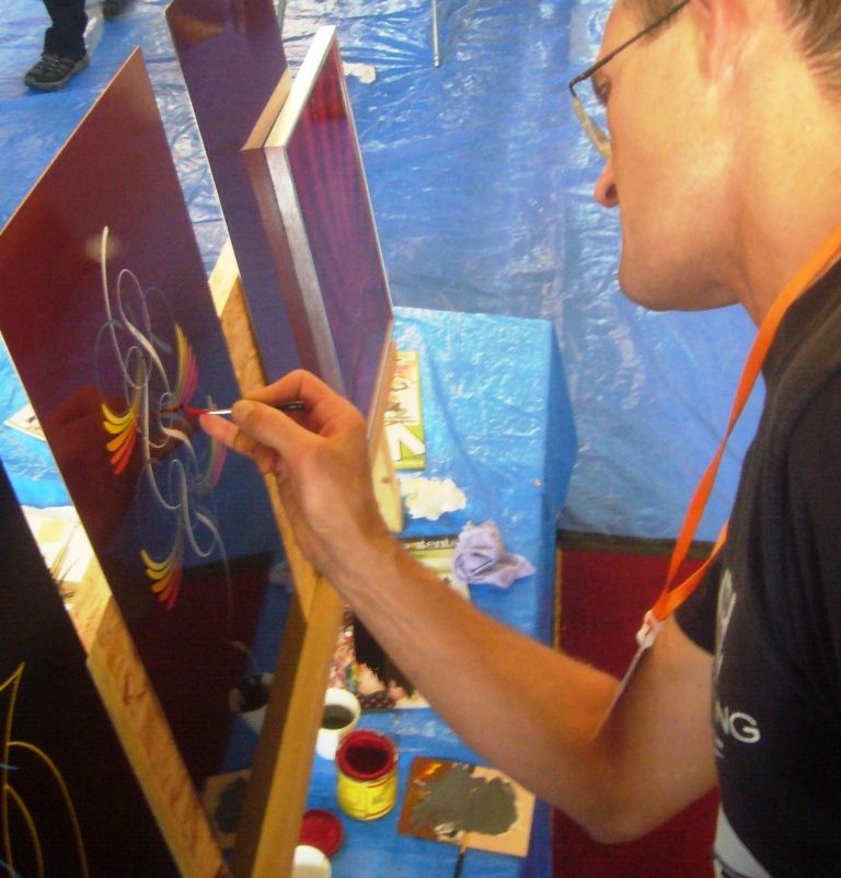 Neil Melliard demonstrating some pinstriping techniques.