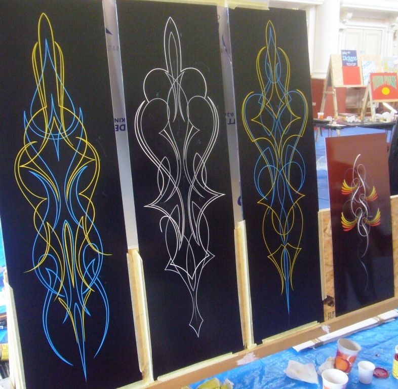 Pinstriping panels on display.