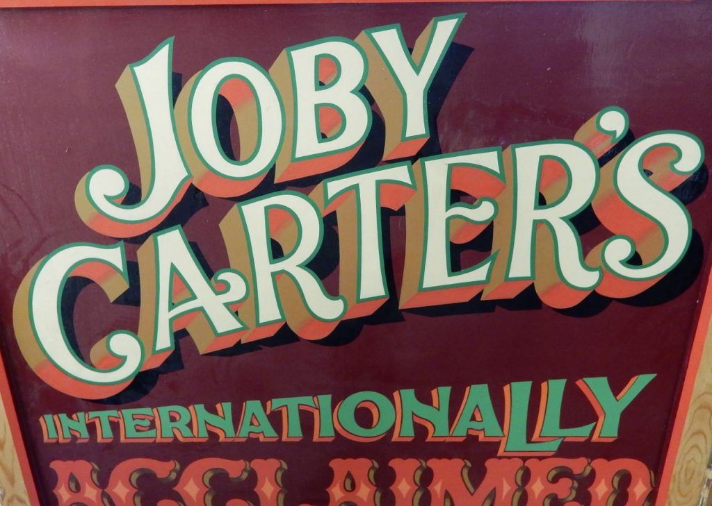 Portion of panel promoting Joby’s popular signwriting workshops