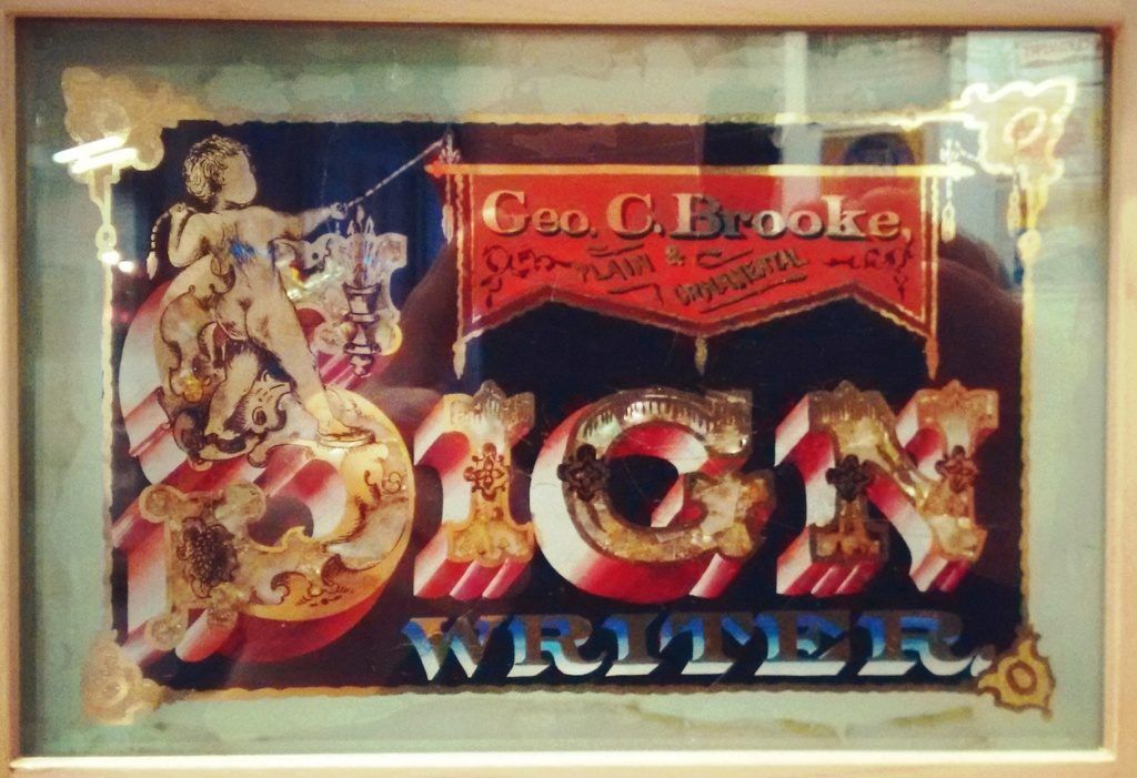The cover piece in a series of 16 plates by George Brooke at the American Sign Museum. Each piece measures c.6-8 inches wide. It dates from 1870, a relatively early use of the term Sign Writer.