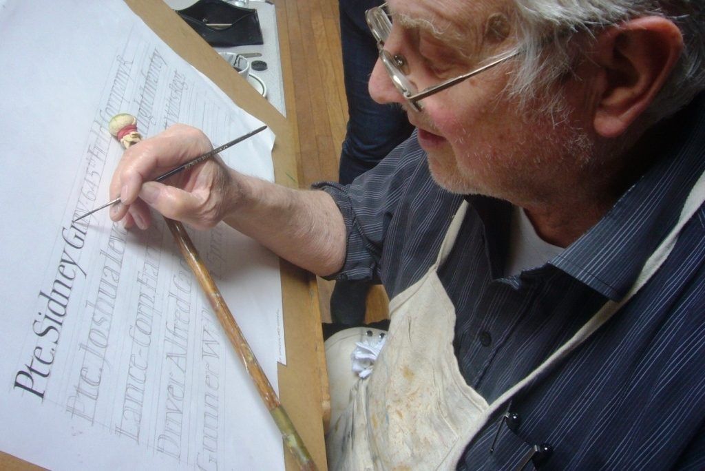 John Nash at work on his brush lettering