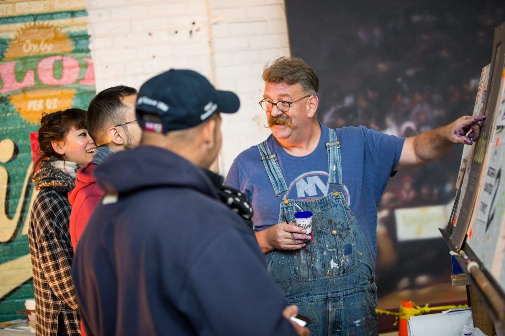 Mike Meyer sharing knowledge with two participants at the Colossal workshop in Brooklyn. (Photo: Christa Lindahl / Colossal Media.)