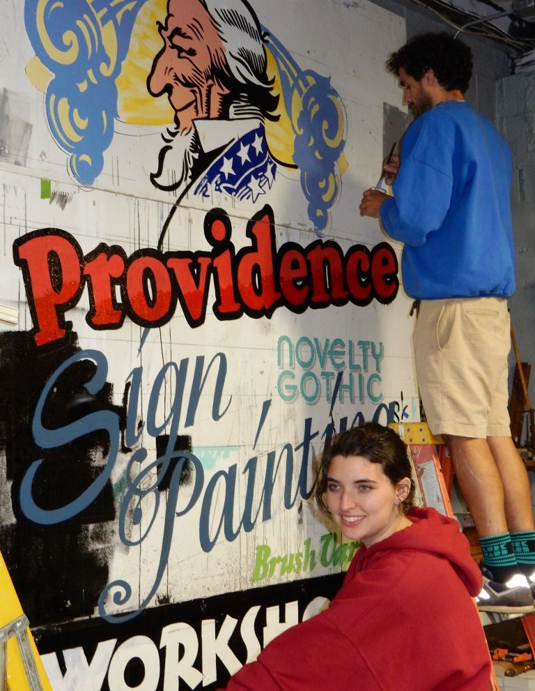 The night shift at Providence Painted Signs got to work decorating one of the blank walls we found there.