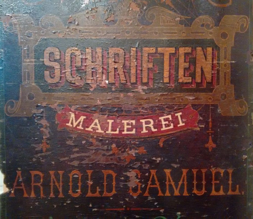Detail of Arnold Samuel’s sign, dating from the 1880s.