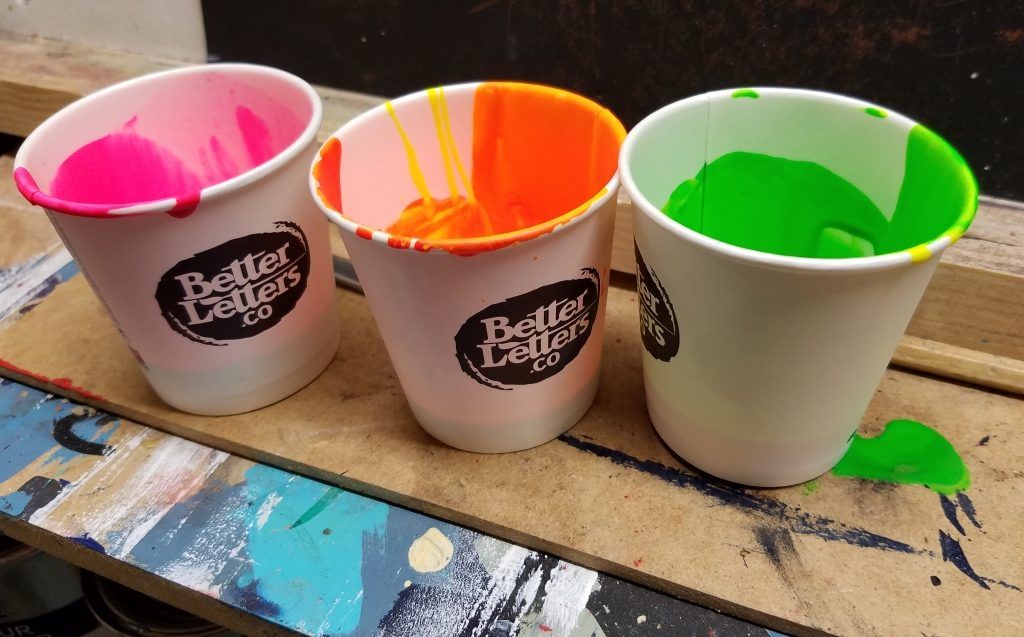 Pink, orange and green Glocote paints.
